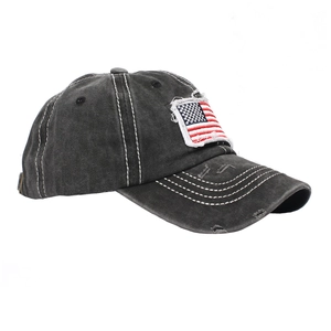 Distressed washed cotton baseball cap with US flag embroidery and ponytail hole detail