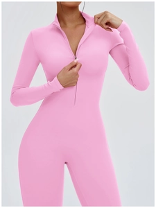 Detailed view of pink long sleeve yoga bodysuit with front zipper and stand collar