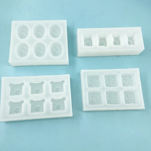 Mini food grade silicone molds in bear, square, and oval shapes for chocolate and baking