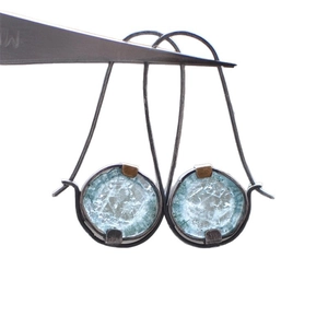 Vintage oxidized metal earrings featuring blue moonstone with unique crackle texture detail