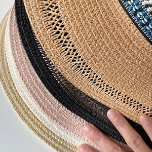 Bohemian woven straw sun hats for women in multiple colors with flat top design