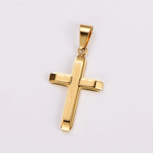 Close-up of golden stainless steel cross pendant with detailed embossed Jesus carving