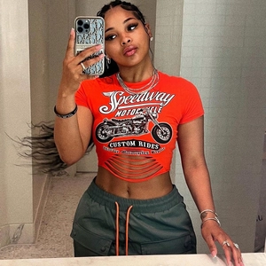 Detail of orange Speedway Motorcycle crop top with ripped hem and vintage print