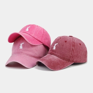 Vintage washed cotton baseball caps with rabbit embroidery in three pink shades