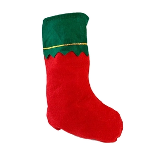 Classic red felt Christmas stocking with green gold-trimmed cuff for holiday decoration