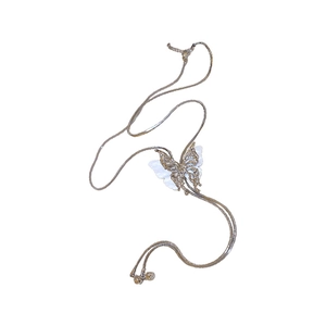 Adjustable gold butterfly tassel necklace featuring white inlay and delicate snake chain
