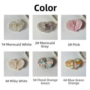 Close-up of 3D orchid hair clips in six pearlescent colors with center pearl accents