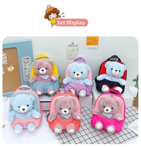 Detail view of six colorful plush bear backpacks with soft detachable teddy bear dolls