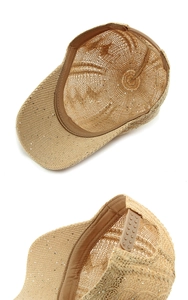 Detail of sequined straw baseball cap showing inner lining and adjustable snap closure
