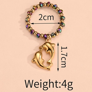 Detail of elastic bead ring with a gold dolphin pendant showing size and 4g weight