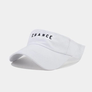 Close-up of black CHANCE embroidery on white washed cotton sun visor hat with stitching