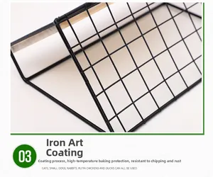Detail of black iron mesh pet fence with wood grain trim and rust-resistant finish