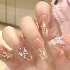 French aurora cat-eye press-on nails with 3D butterfly charms and gradient pink stars