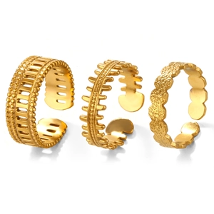Three-piece gold plated stainless steel open ring set with various textured patterns