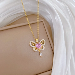Titanium butterfly tassel necklace with pink heart gemstone and sparkling crystals