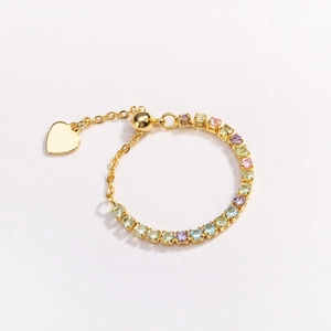 Detail of adjustable chain ring with colorful square-cut stones and heart charm
