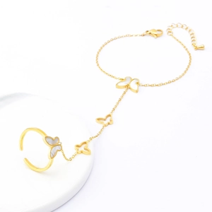 Bracelet bague papillon doré élégant avec bague réglable et détails en nacre blanche