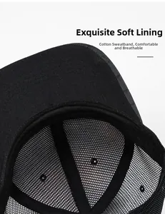 Detail of breathable mesh structure and soft cotton sweatband inside the black trucker hat