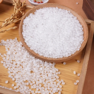 Translucent white round beads for DIY slime filling and handmade food crafts in wood bowl