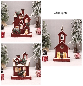 Three illuminated red wooden Christmas house ornaments with faux snow and LED warm lighting