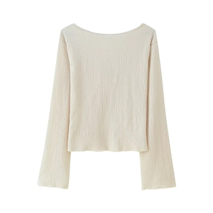 Women's V-neck textured long sleeve top and pants set in beige with flare sleeves