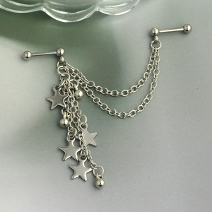 Detail of silver stainless steel industrial barbell with chains and star charms