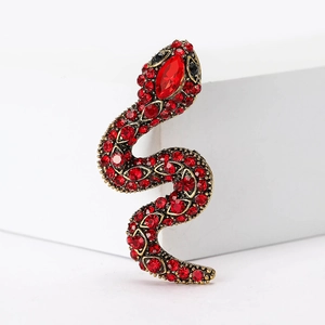Vintage gold snake brooch set with red rhinestones for suits and coats accessory