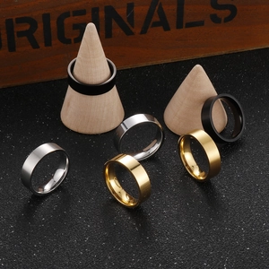 Titanium steel couple rings in black, gold, and silver with polished and brushed finishes
