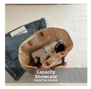 Spacious interior of woven straw tote bag showing capacity for daily essentials