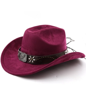 Detail of burgundy suede cowboy hat with brown leather band and embossed eagle buckle
