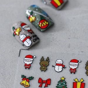 Professional 5D embossed Christmas nail art stickers with Santa and reindeer motifs