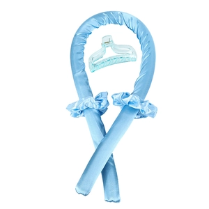 Detail view of blue satin heatless hair curler set with matching scrunchies and claw clip