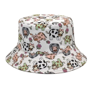 Unisex cow print cotton bucket hat with cute cartoon cow and flower patterns in white
