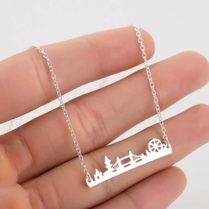 Silver London skyline pendant necklace featuring the London Eye and Tower Bridge