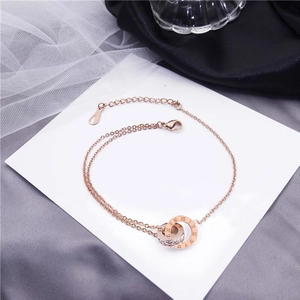 Elegant 18k rose gold double ring anklet with roman numerals and sparkling zircons