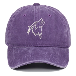 Vintage washed purple baseball cap with white wolf head embroidery on front