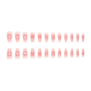 Pink gradient press-on nails with white hearts, starbursts and grid patterns set of 24