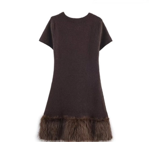 Detail of dark brown short sleeve dress with fluffy faux fur hemline on white background