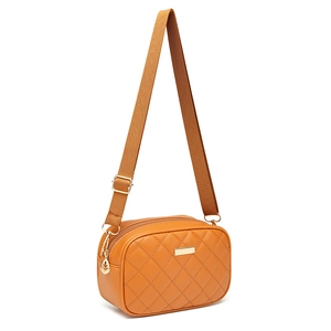 Orange quilted shoulder camera bag with gold hardware and woven strap in 45-degree view