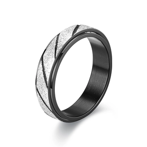 Rotating rose gold ring with frosted sand finish and silver textured diagonal lines