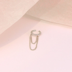Close-up of S925 silver ear cuff with double chain fringe and sparkling zircon stones