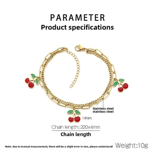 Detailed view of 18K gold plated stainless steel layered chain with red cherry charms