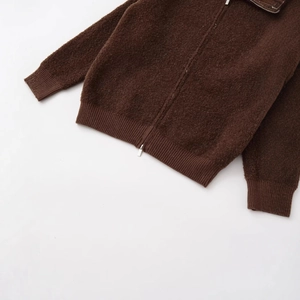 Women's dark brown textured bouclé bomber jacket with silver zipper and ribbed cuffs