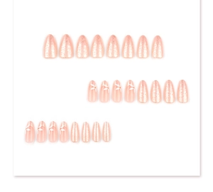 Detailed flat lay of 24 almond-shaped press-on nails with pink base and white floral art
