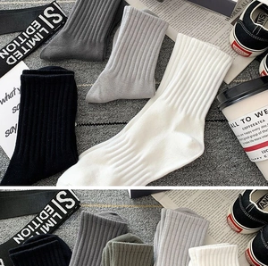 Detail of ribbed knit cotton crew socks in multiple colors with a stylish casual layout
