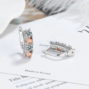Elegant S925 sterling silver hoop earrings with white and champagne zircon stones