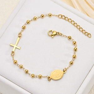 Golden stainless steel beaded bracelet featuring Virgin Mary medal and cross pendant