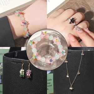 Handmade 4mm glass bead jewelry set featuring colorful bracelets, rings and earrings