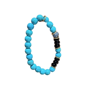 Vintage geometric beaded bracelet with blue turquoise stones and black onyx beads