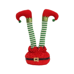 Christmas elf legs decoration with festive red and green stripes for holiday party decor